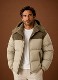 Men's hooded winter puffer jacket featuring a stylish corduroy collar, perfect for cold weather and outdoor activities. 0