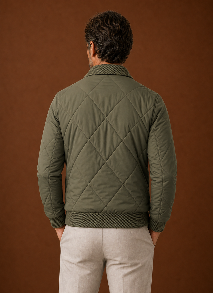 Men's Quilted Bomber Jacket featuring a zip closure and ribbed trim, perfect for casual styling and warmth in cooler weather. 6