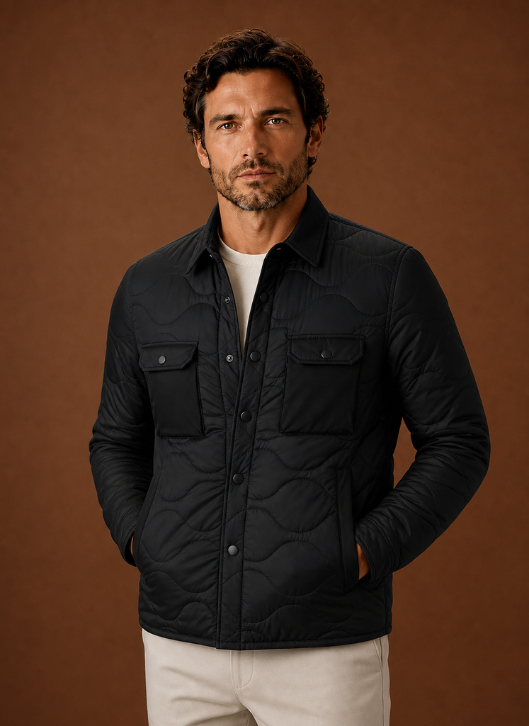 Men's quilted shirt jacket designed for versatile layering and stylish comfort, featuring a modern fit, durable fabric, and multiple pockets for functionality. 0