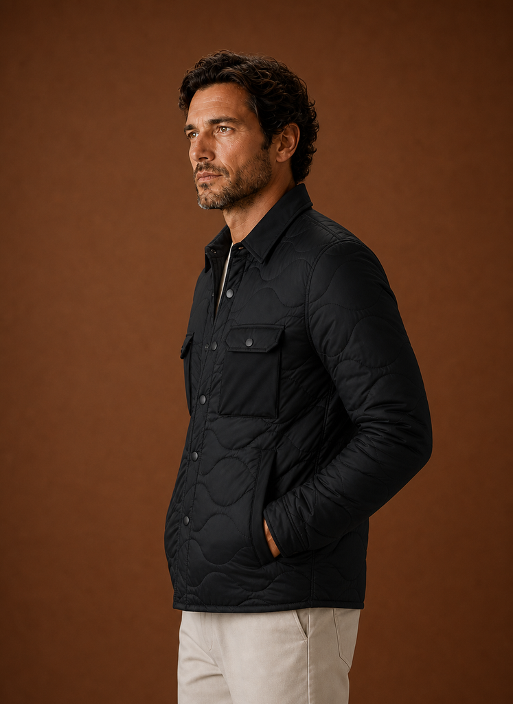 Men's quilted shirt jacket designed for versatile layering and stylish comfort, featuring a modern fit, durable fabric, and multiple pockets for functionality. 1