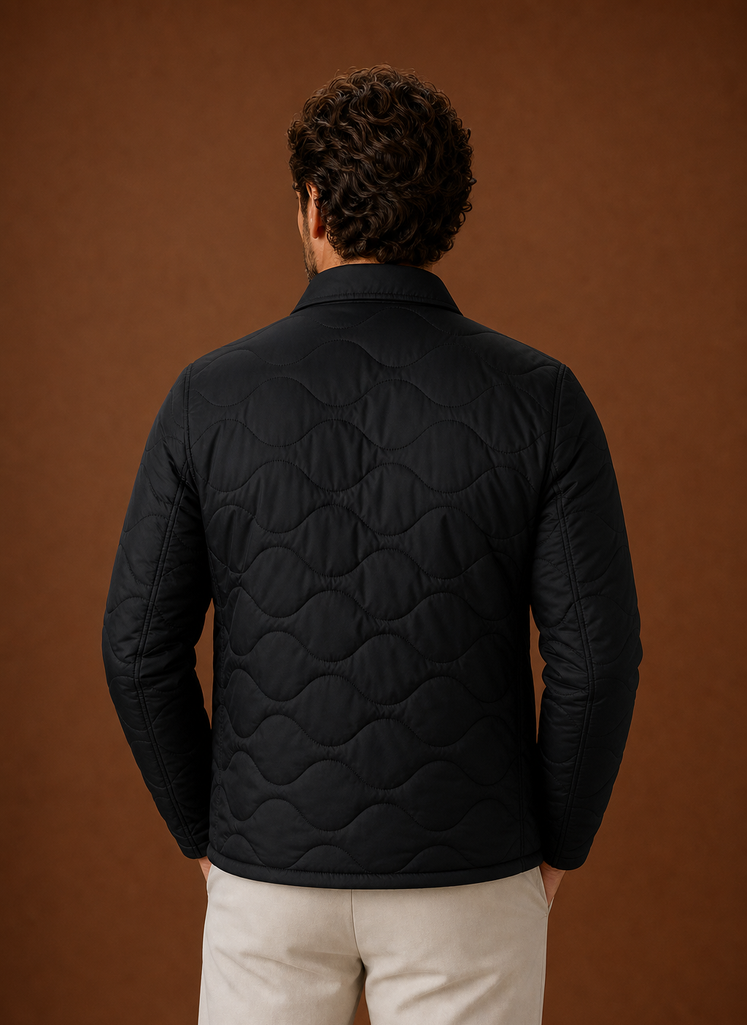 Men's quilted shirt jacket designed for versatile layering and stylish comfort, featuring a modern fit, durable fabric, and multiple pockets for functionality. 2