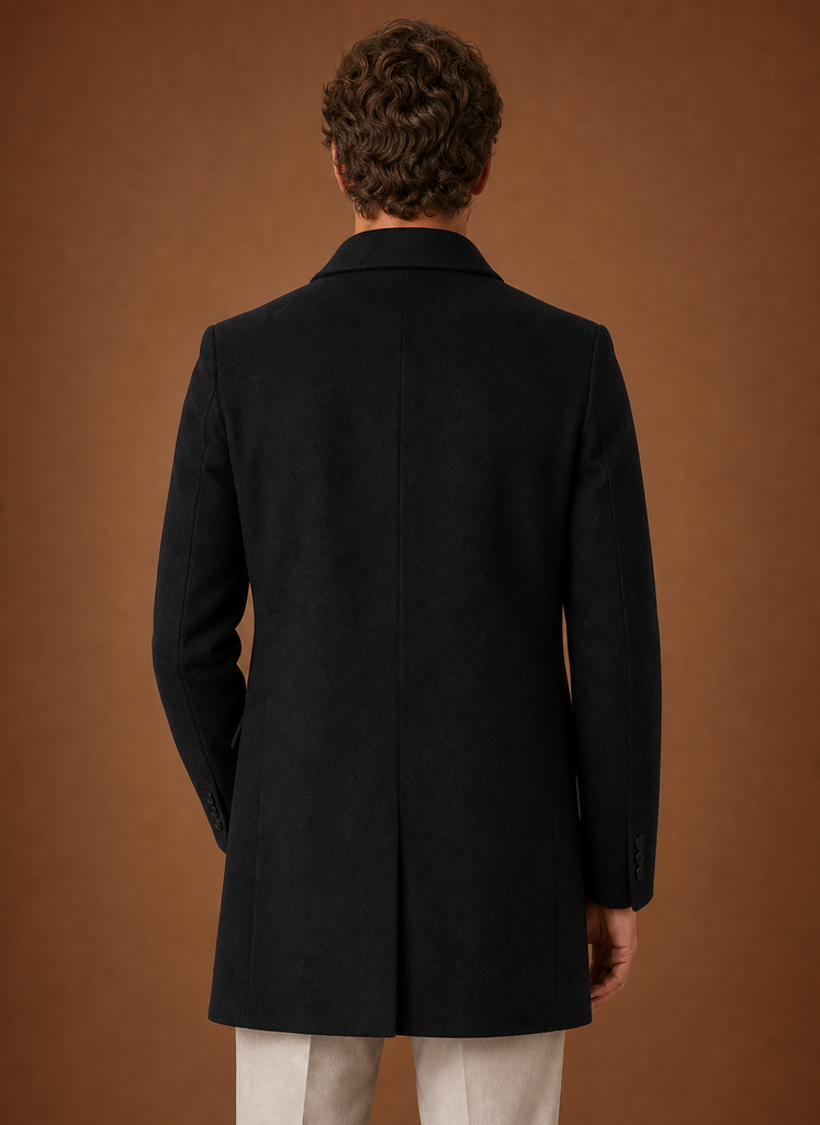 Men's tailored long overcoat featuring a structured fit, perfect for stylish winter wear, showcasing a classic design in a warm fabric. 2